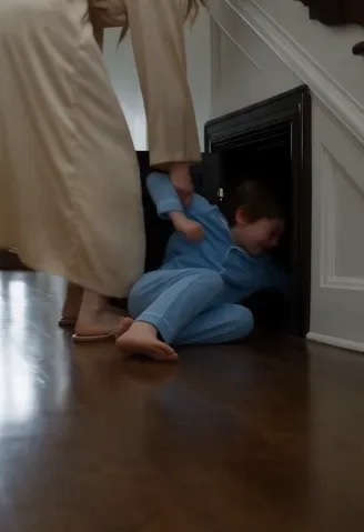 Then he came home early and found the boy hiding like a prisoner in his own house.