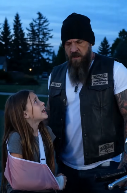 A trembling 10-year-old with a shattered arm begged my biker gang to hide her. At the ER, a well-dressed man stormed in. “She’s my property. Move, biker trash!” he snarled. I blocked the door. “The bone says you twisted it,” I whispered. “I’ll call the cops!” he yelled. I smiled. “They’re already here.” Suddenly, the hospital doors locked, and…