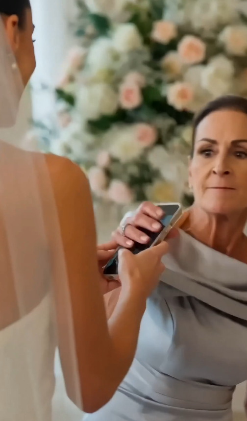 “She slapped the bride over a child’s photo… then the groom turned pale.”